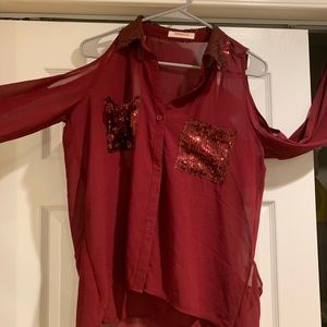 Red upper arm cut out sequined top
